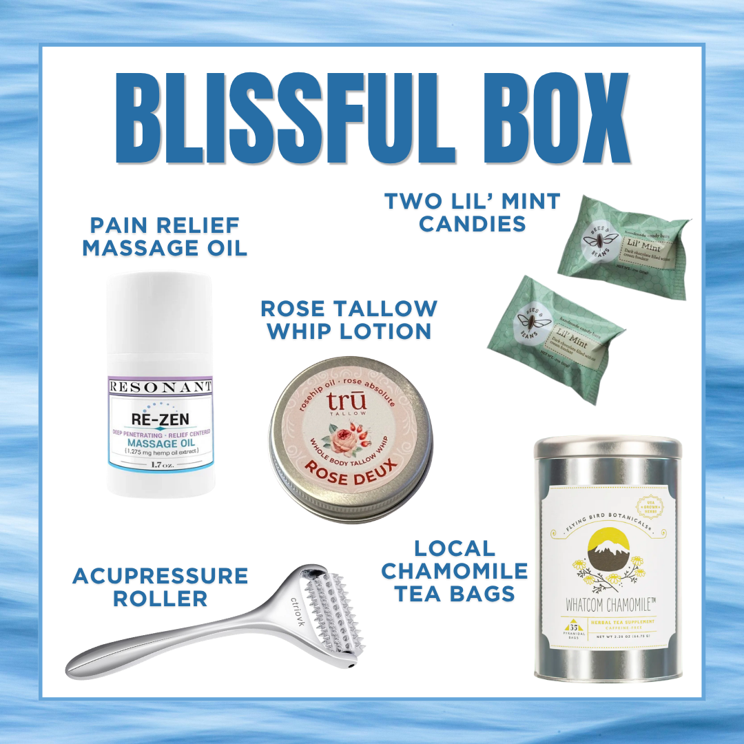 Blissful Box with various wellness products on a blue background