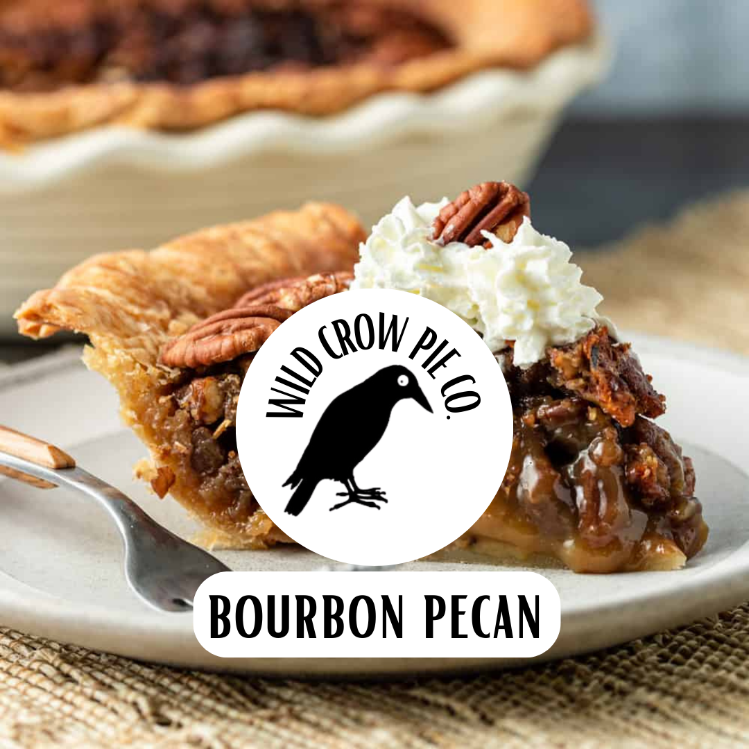 Piece of Bourbon Pecan Pie with the Wild Crow Pie logo on a white circle