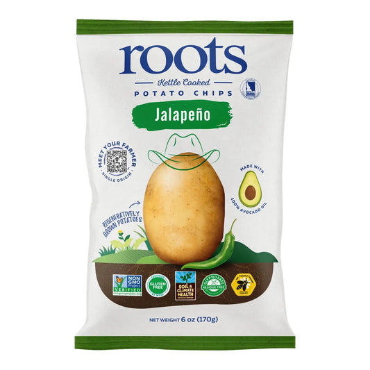 A package of Roots brand Jalapeño kettle-cooked potato chips. The packaging is predominantly white with green accents, featuring an image of a potato and jalapeño peppers.