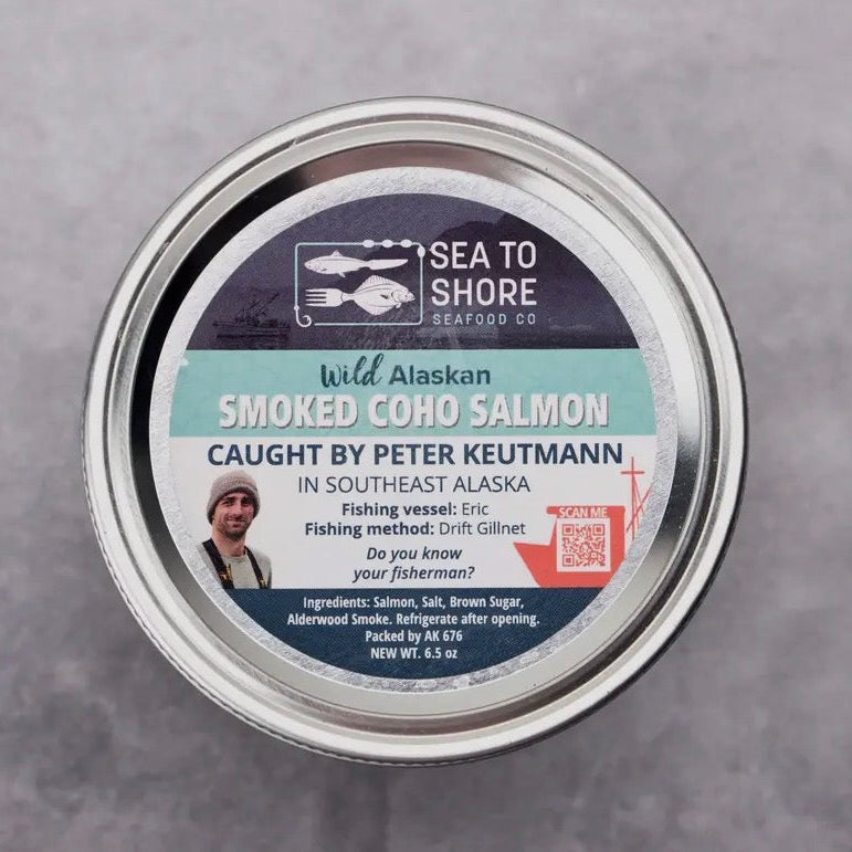 Can of smoked coho salmon with 'Sea to Shore' label on a gray background