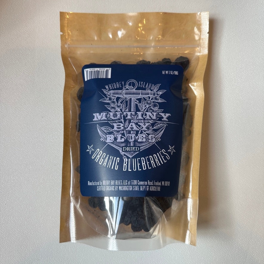 Packaged organic blueberries with a blue label on a white background