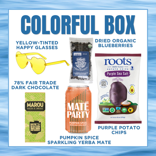 Colorful box with various snacks and products on a blue background
