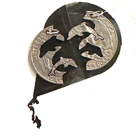 Decorative item with cut-out shapes of birds on a white background