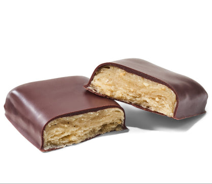 Broken in half candy, cashew flake wrapped in dark chocolate