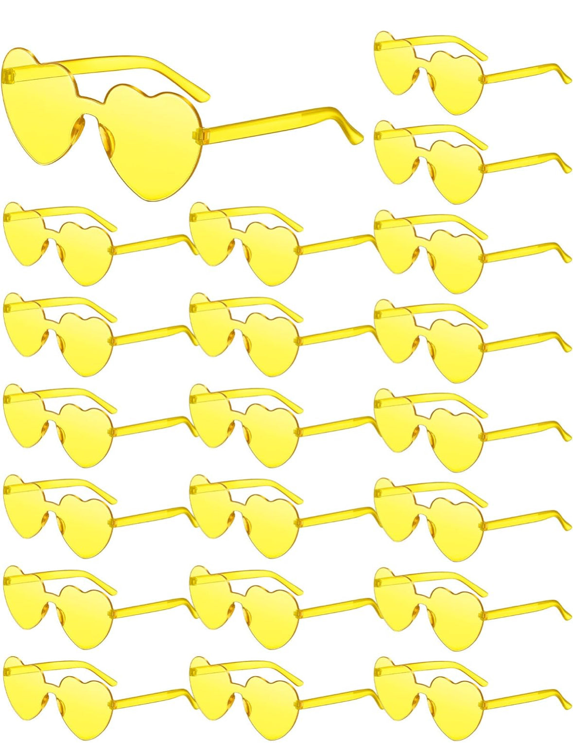 A collection of yellow tinted glasses with a heart-shaped design, displayed in multiple rows.