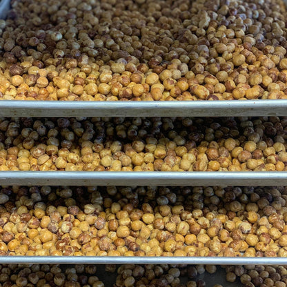 Baking trays full of roasted hazelnuts