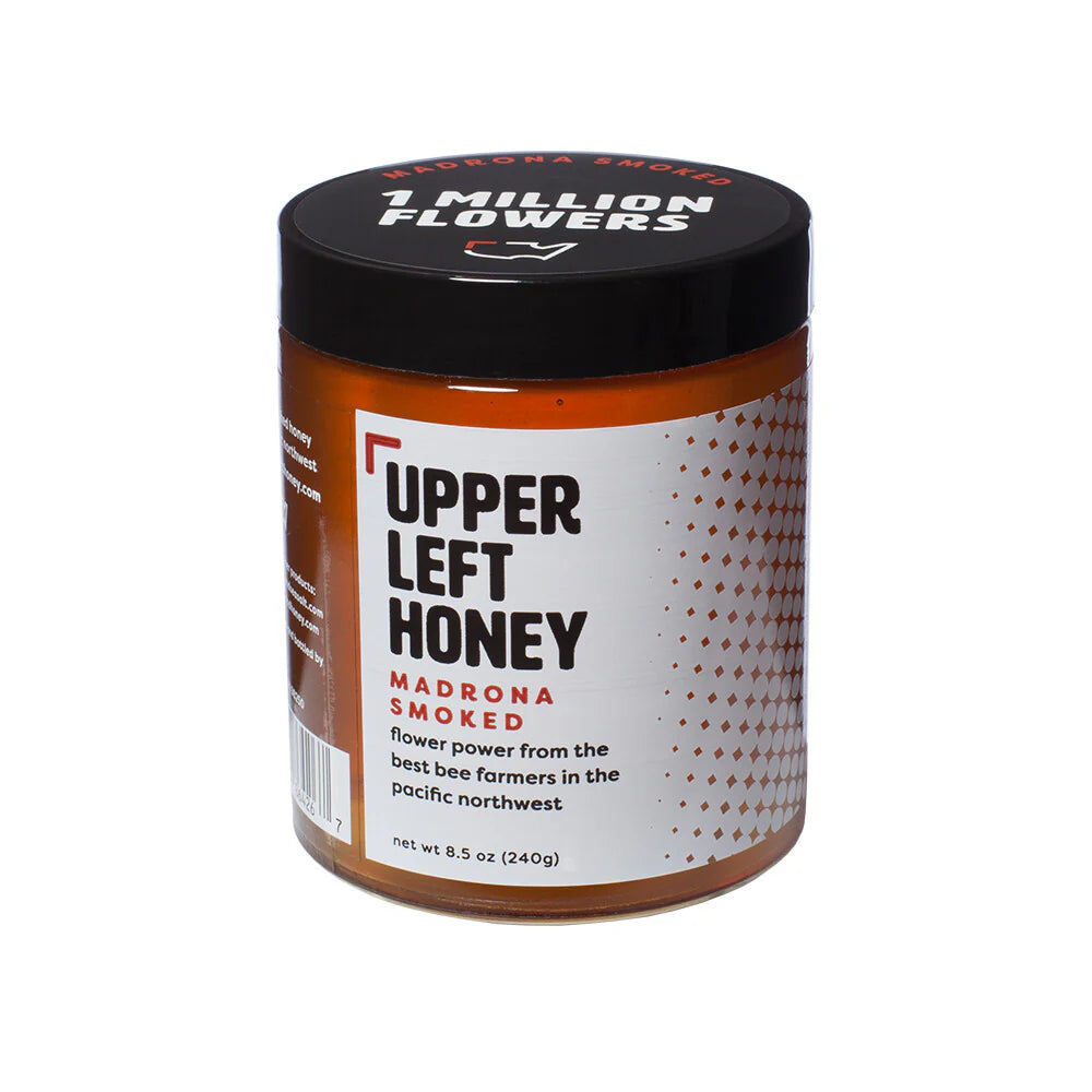 Jar of Upper Left Honey with '1 Million Flowers' branding on a white background