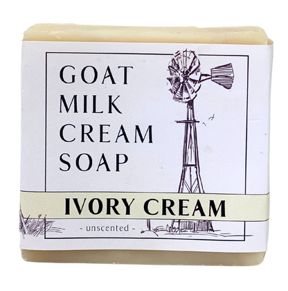 Bar of goat milk cream soap with a windmill illustration on the label.