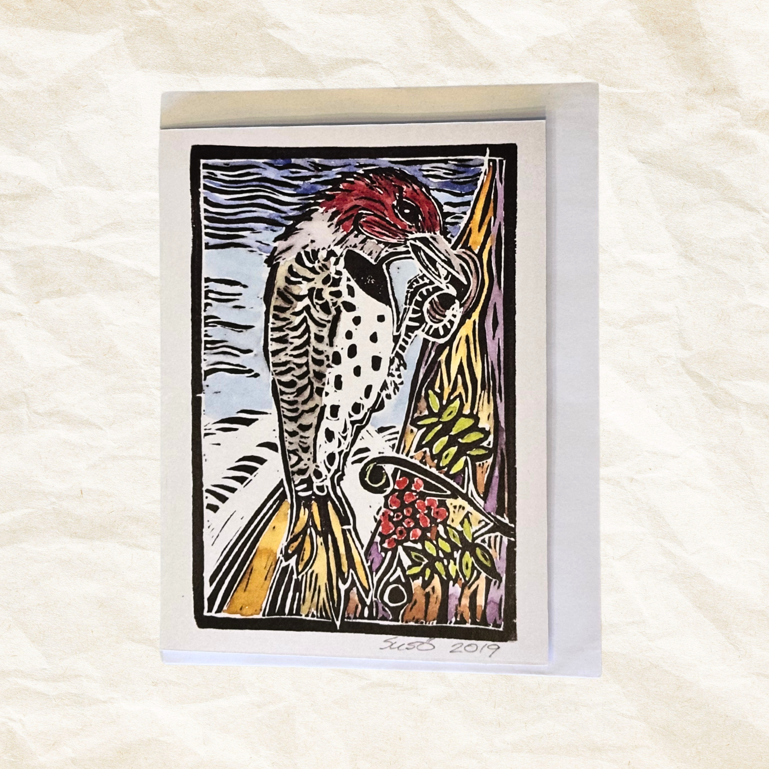 Card with a stylized illustration of a bird on a white background