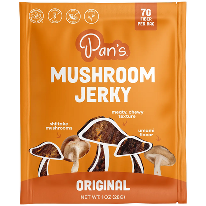 Packaging of Pan's Mushroom Jerky with mushroom illustrations on an orange background