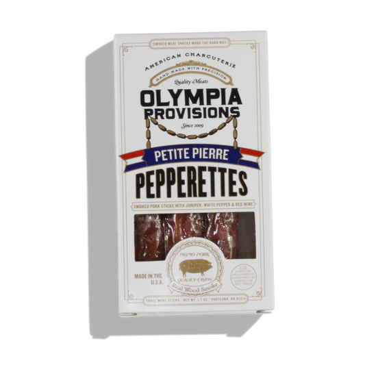 Box of Olympia Provisions Petite Pierre Pepperettes on a white background