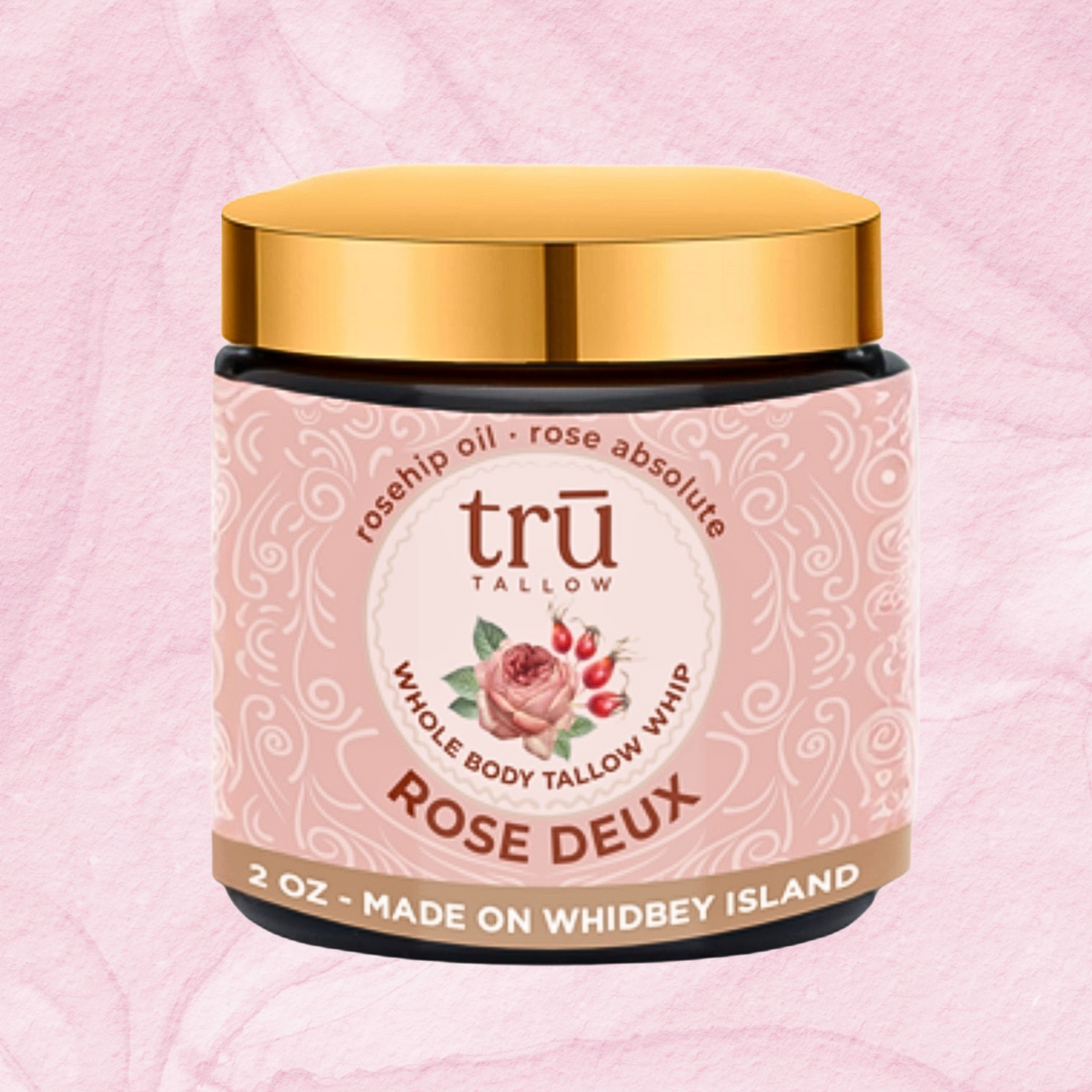 Tallow balm container labeled 'Rose Deux' on a pink background