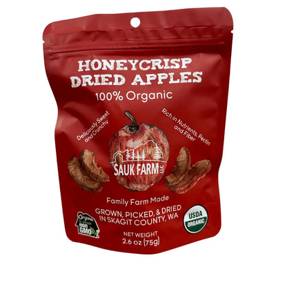 A red resealable bag of Sauk Farm Organic Honeycrisp Dried Apple Chips with an image of the dried apple chips on the front.