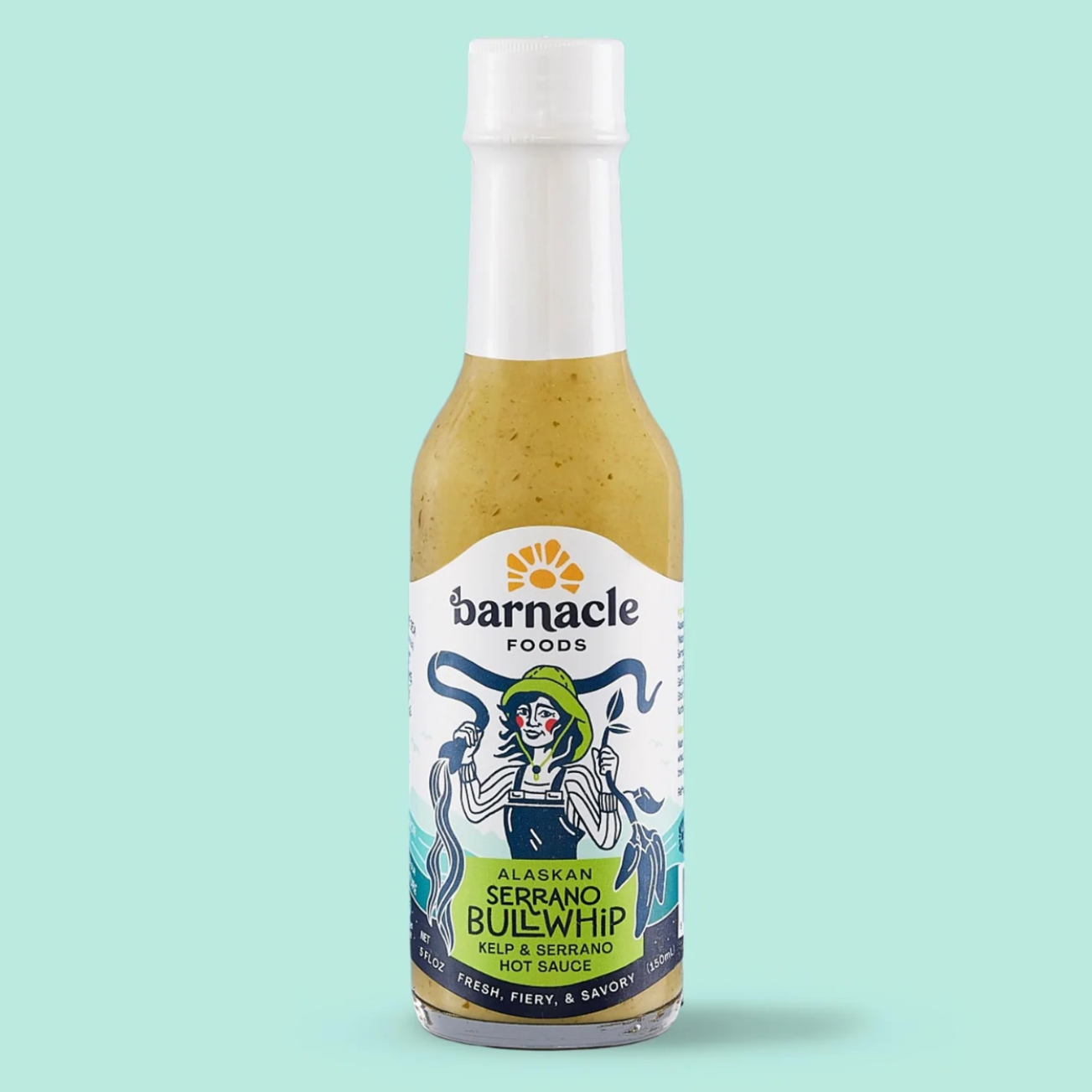 Bottle of Barnacle Foods Serrano Bullwhip sauce on a light blue background