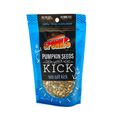 A blue bag of Spunk's Pumpkin Seeds with a 'Sea Salt Kick' flavor, displaying the product and its name on the front.